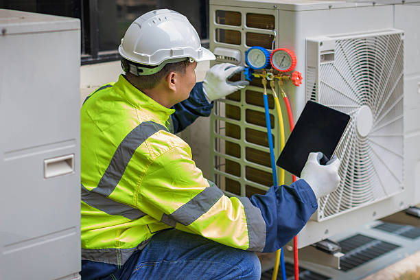 Professional Hvac technician working in Adelanto, CA